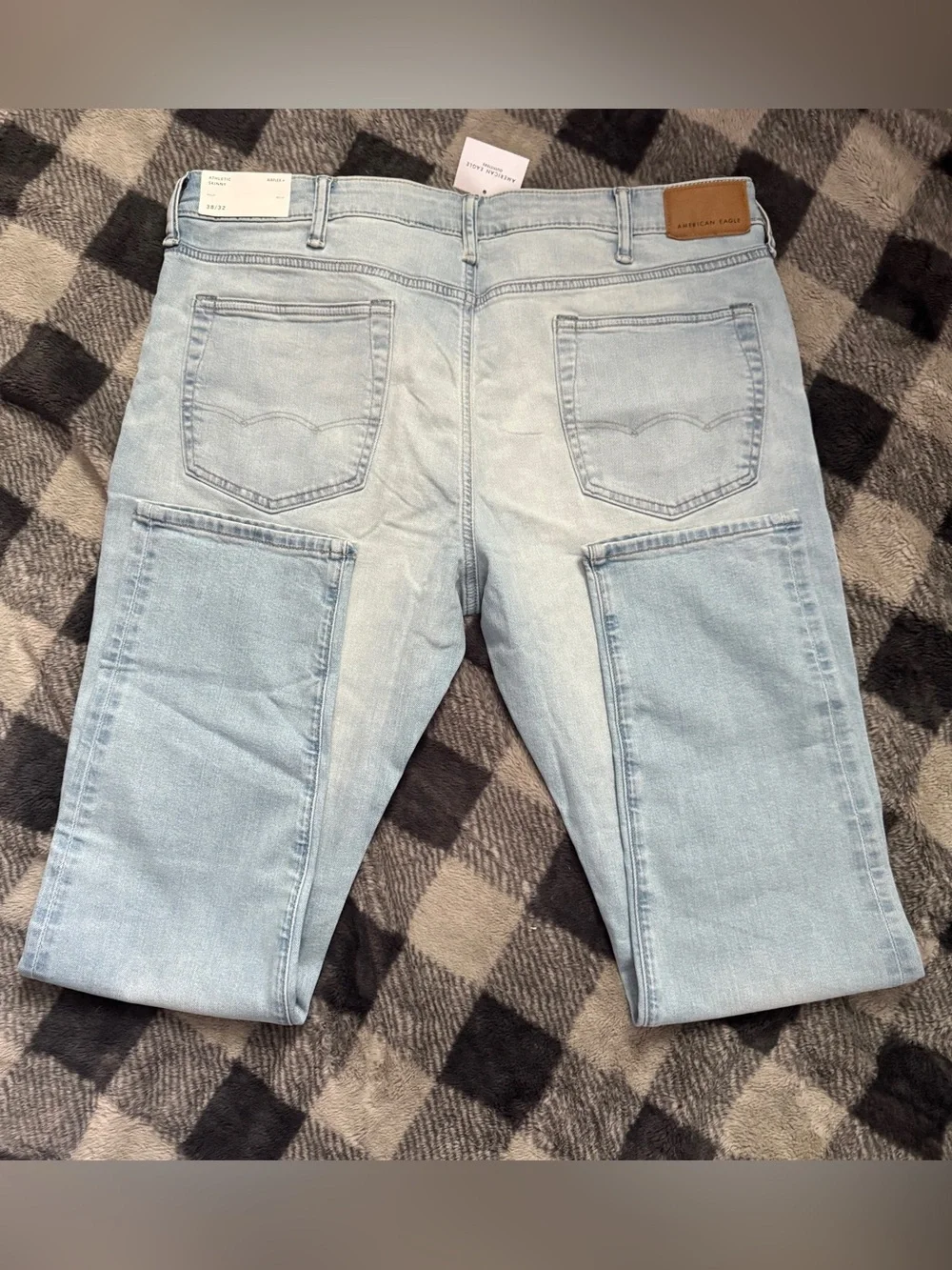 NWT-American Eagle Light Wash Denim Jeans Athletic Skinny Airflex+. 38/32